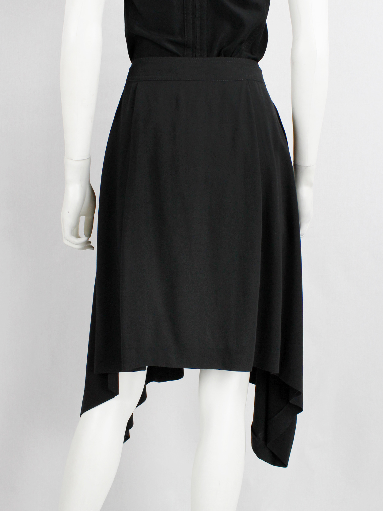 Ann Demeulemeester black skirt with buttons and curved hem — fall 2014 ...