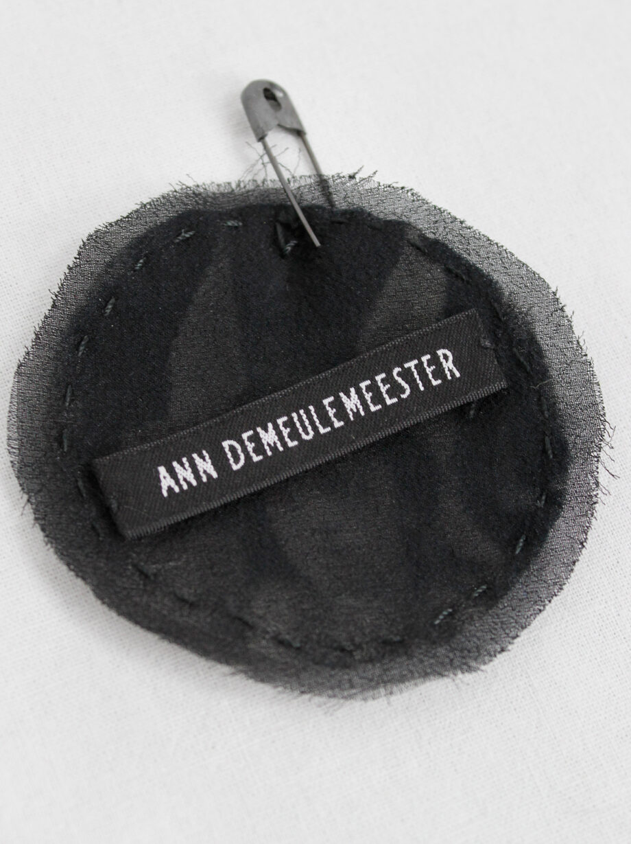Ann Demeulemeester circle brooch with cherub print stitched onto black silk fall 2005 (2)