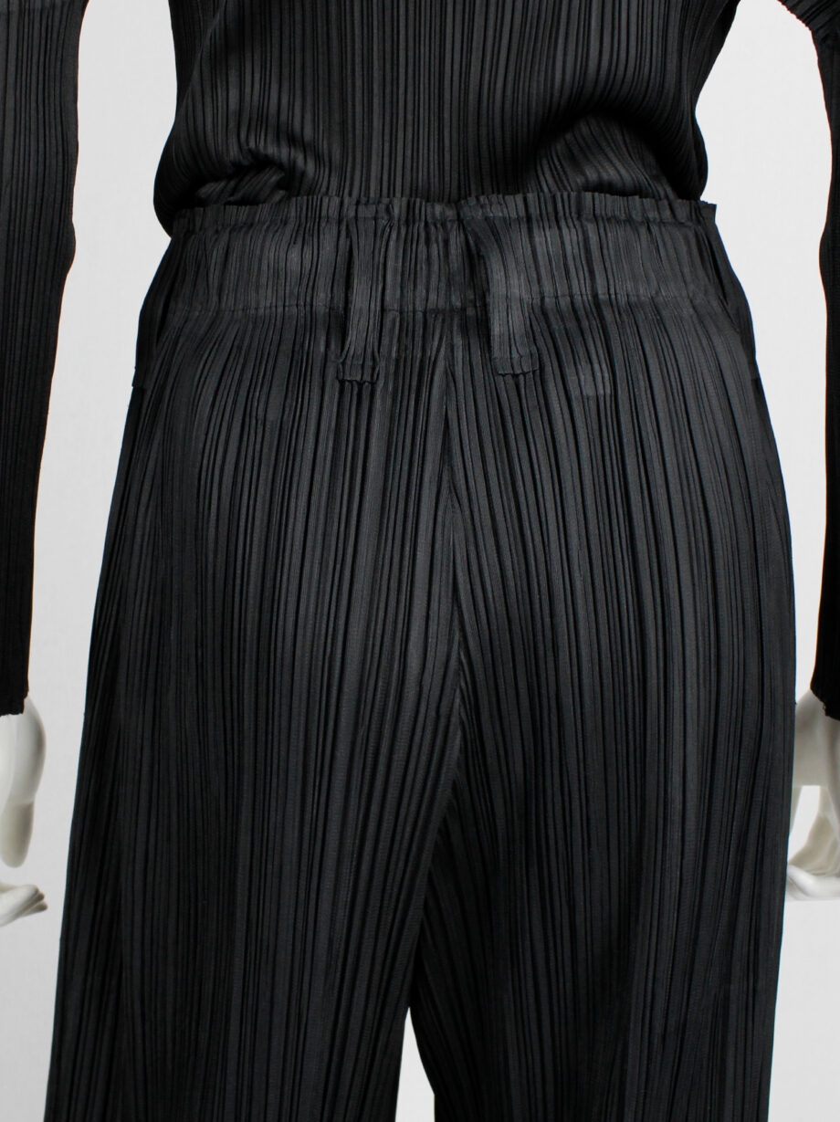Issey Miyake Pleats Please black pleated trousers with wide legs and fake button closure (7)