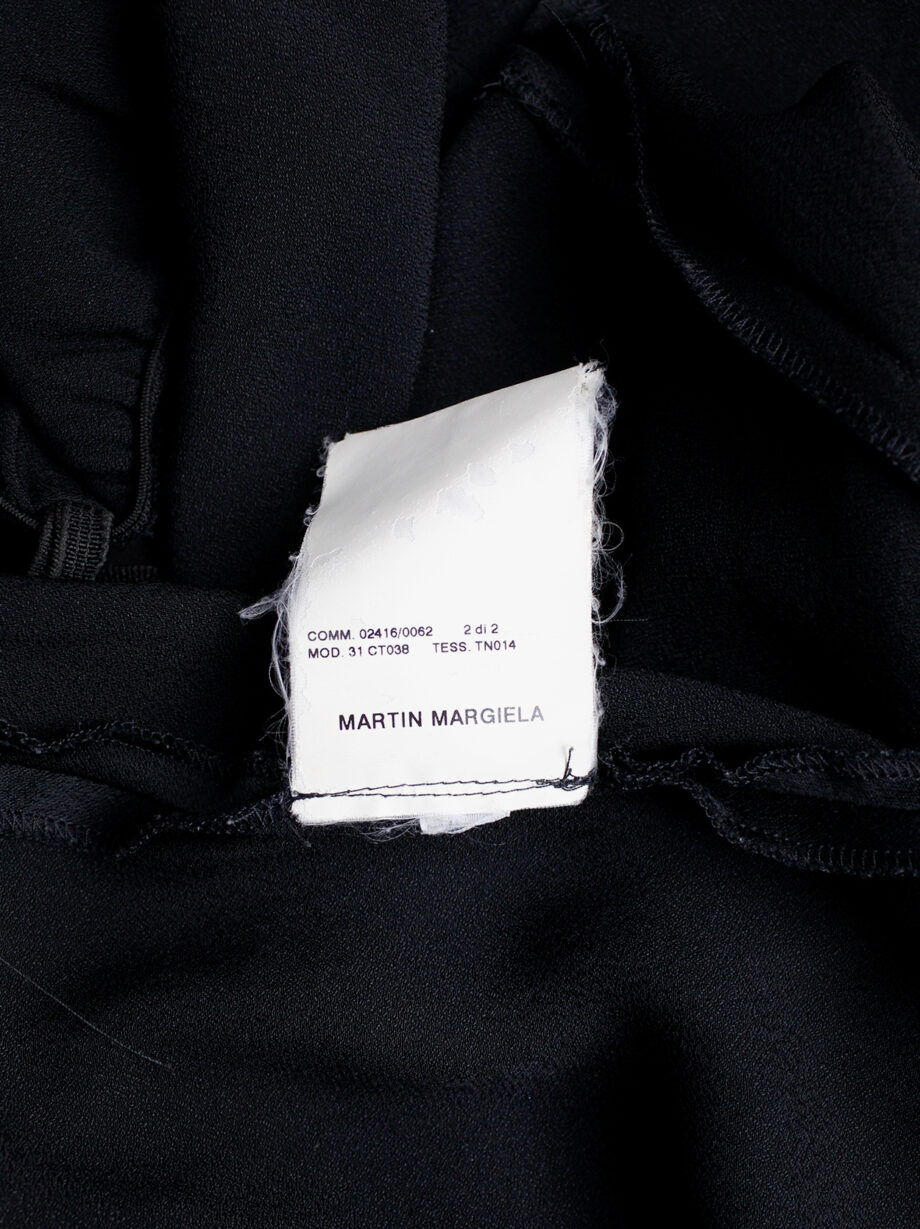 Maison Martin Margiela black backless dress with straps modeled after a car seat cover fall 2006 (12)