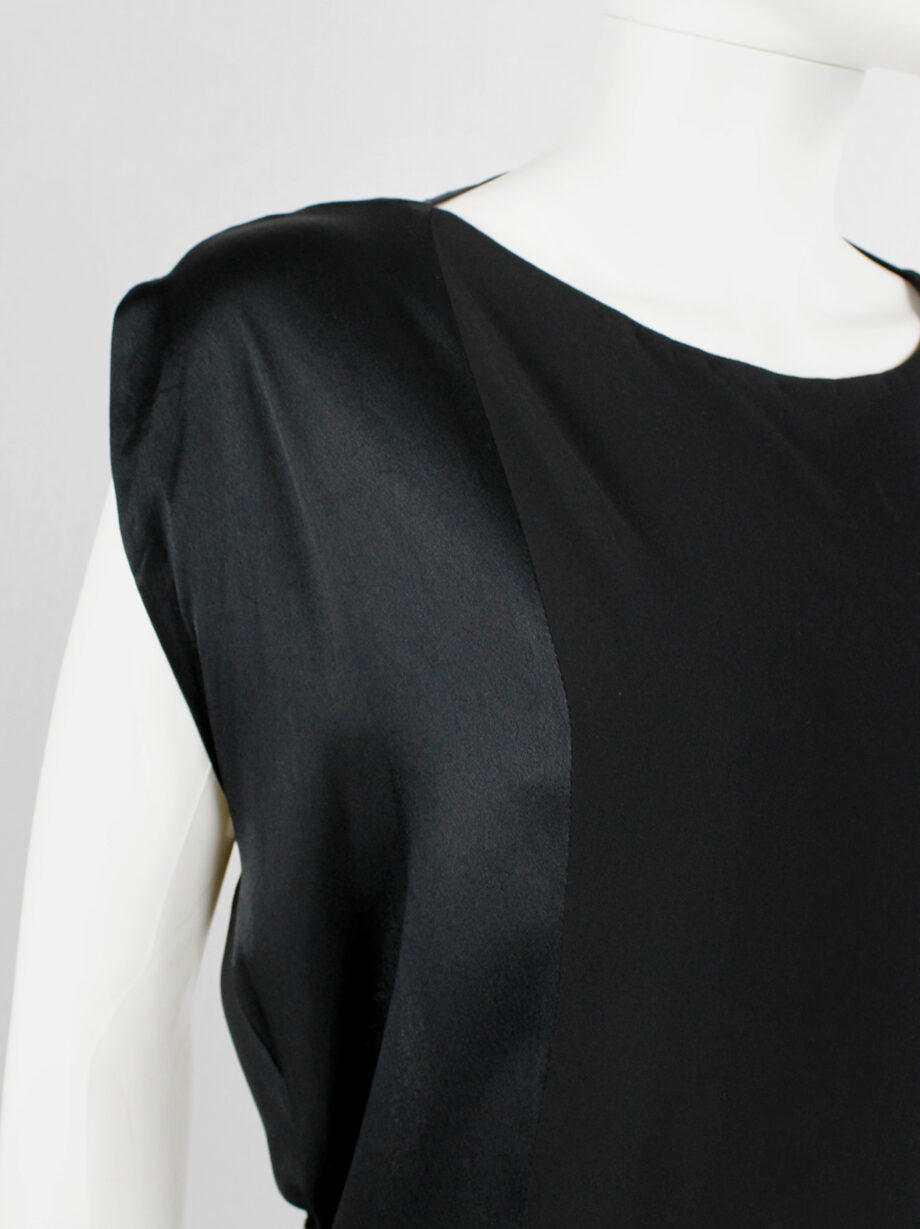 Maison Martin Margiela black backless dress with straps modeled after a car seat cover fall 2006 (19)