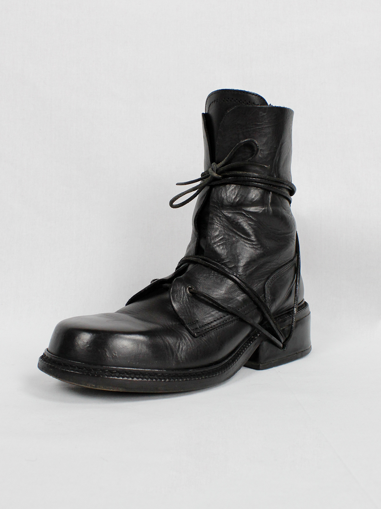 Dirk Bikkembergs black combat boots wrapped with laces through the ...