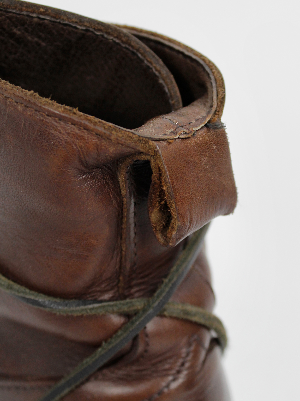 Dirk Bikkembergs brown combat boots wrapped by laces through the soles ...