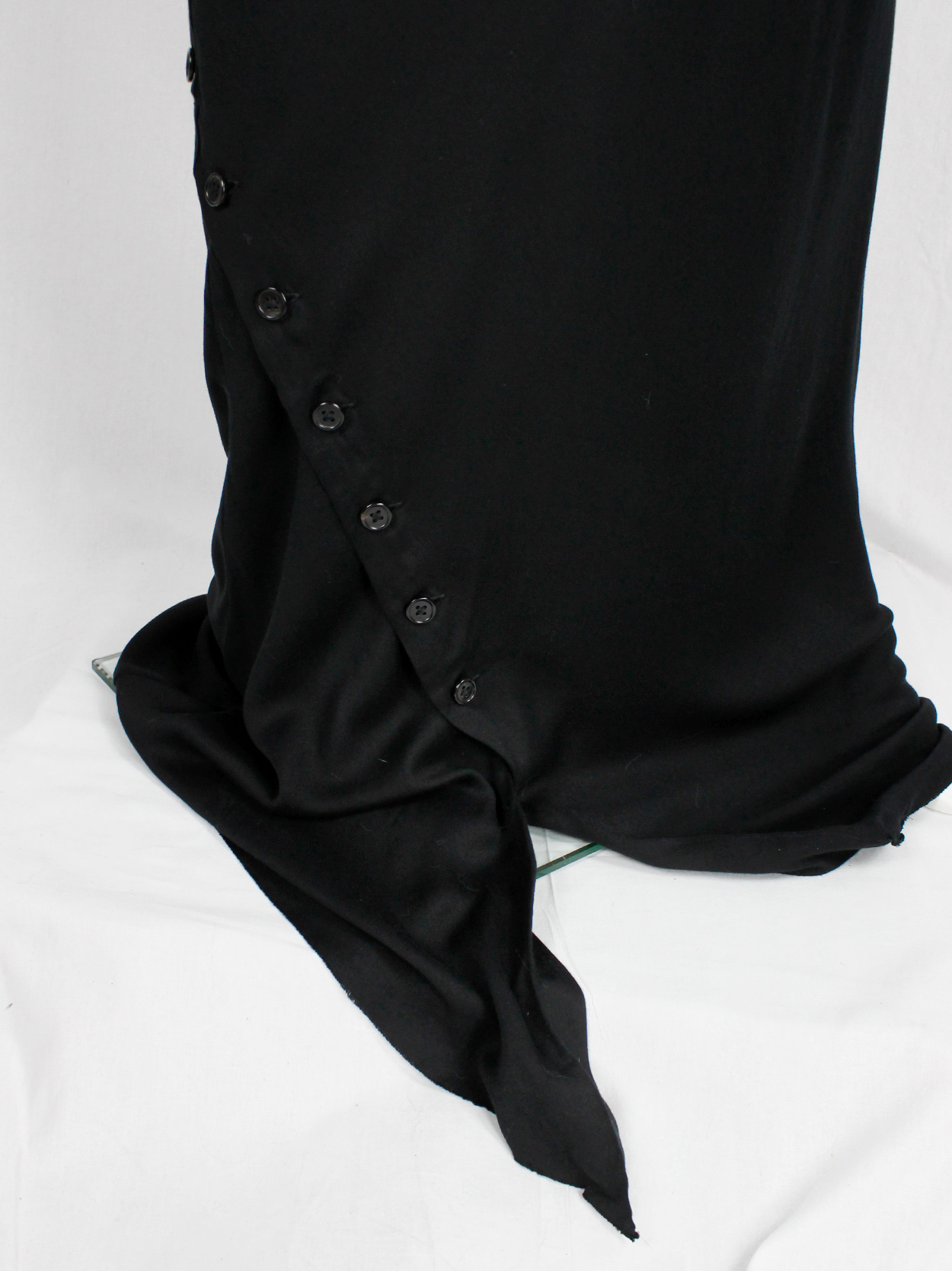 Ann Demeulemeester black floor length skirt with buttoned slit twisting ...