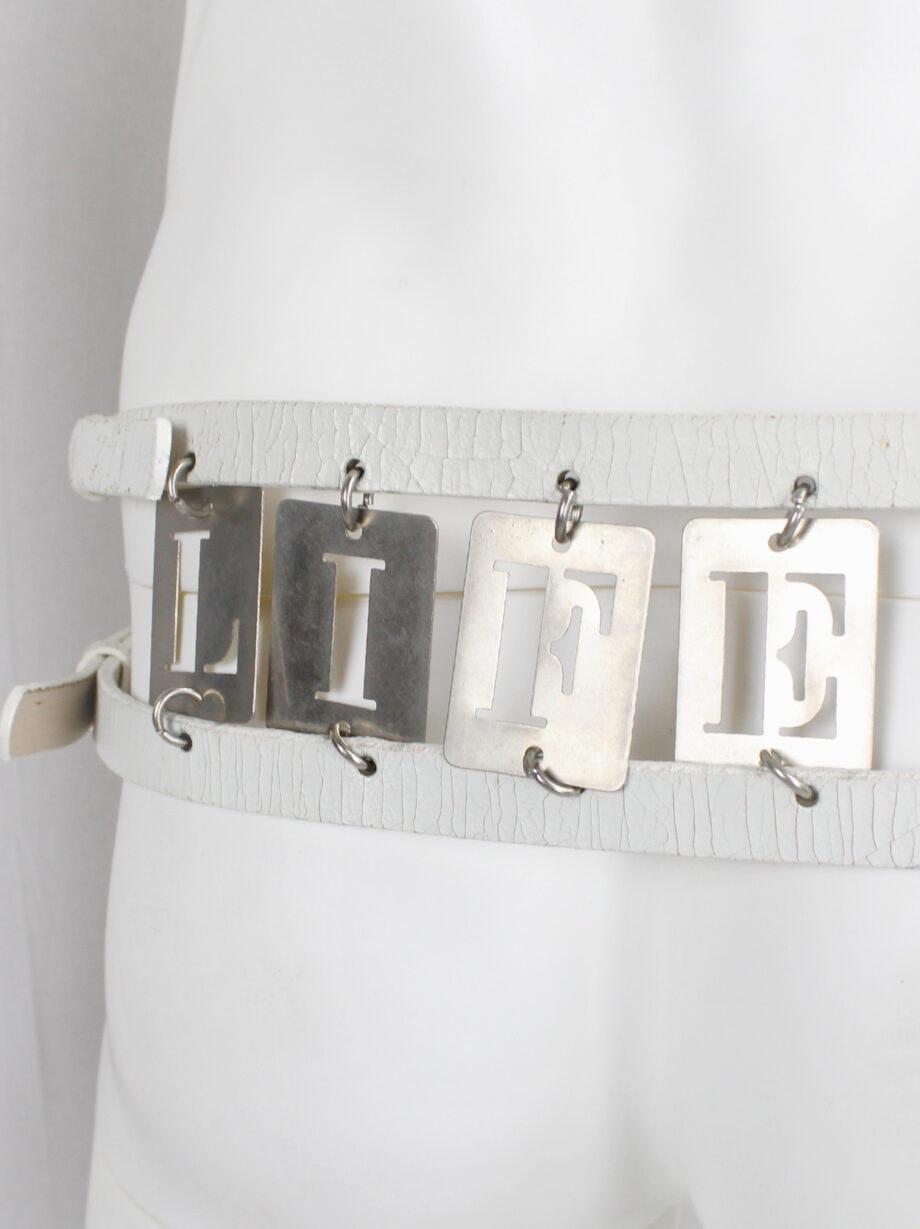 Ann Demeulemeester two white leather belts attached by metal LIFE and LIVE dogtags spring 2003 (17)
