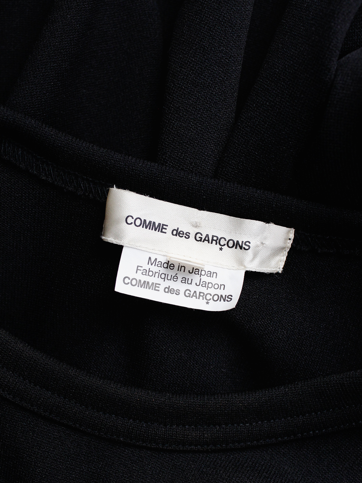Comme des Garçons black jumper with three-dimensional armor sleeves ...