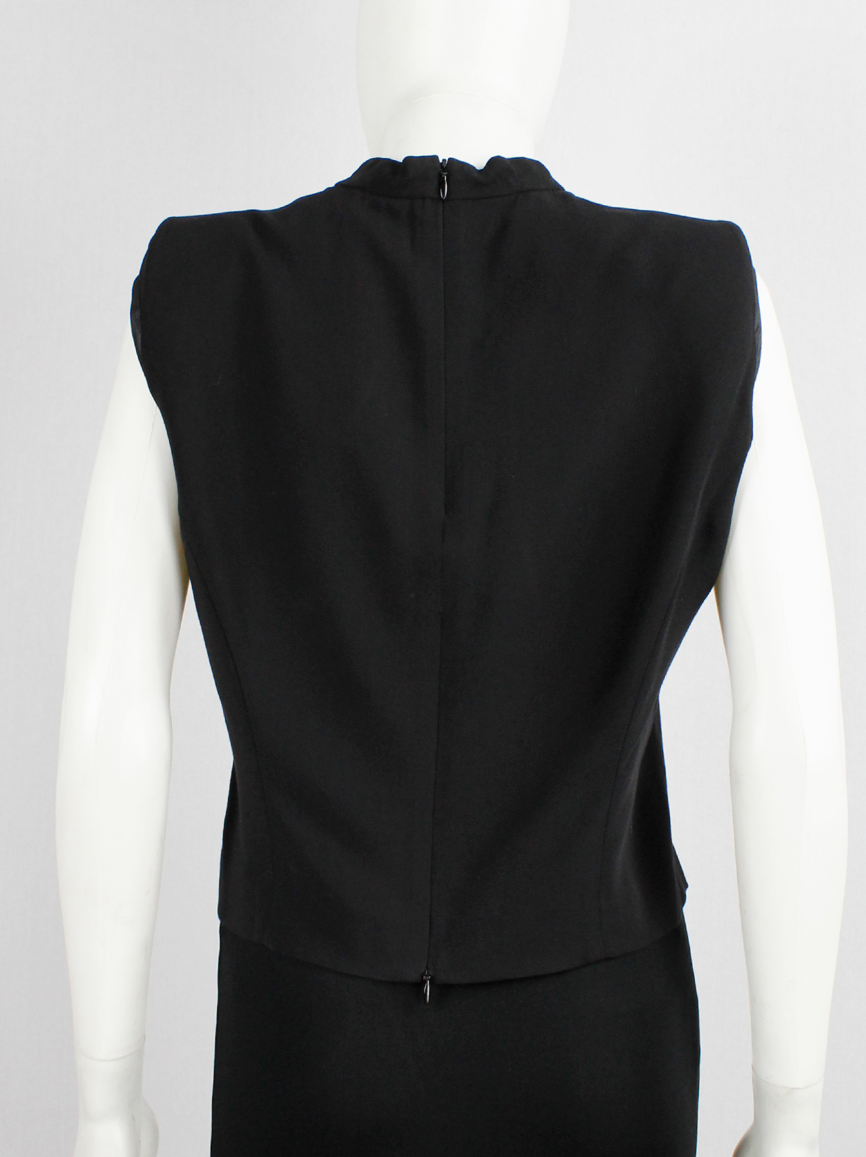 Ann Demeulemeester black top with padded shoulders and mock turtleneck ...
