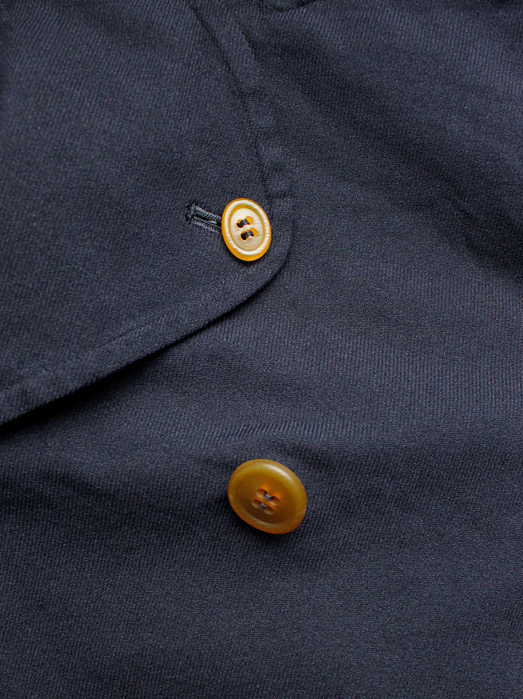 Comme des Garçons dark navy capelet from a cut off trenchcoat with orange buttons fall 2002 (11)