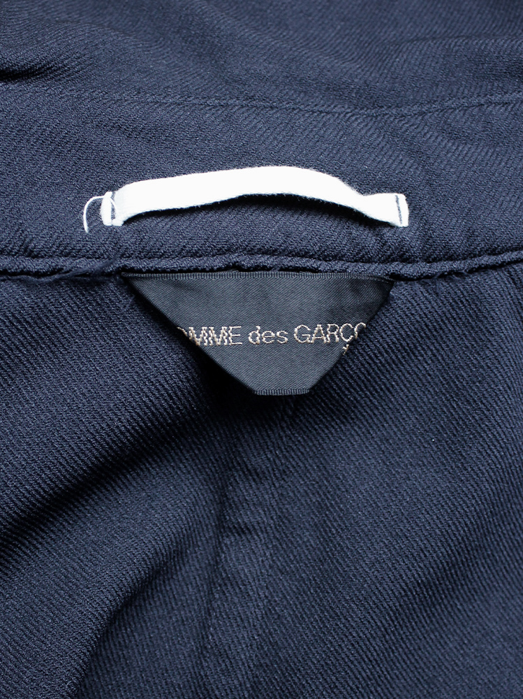 Comme des Garçons dark navy capelet from a cut off trenchcoat with orange buttons fall 2002 (12)