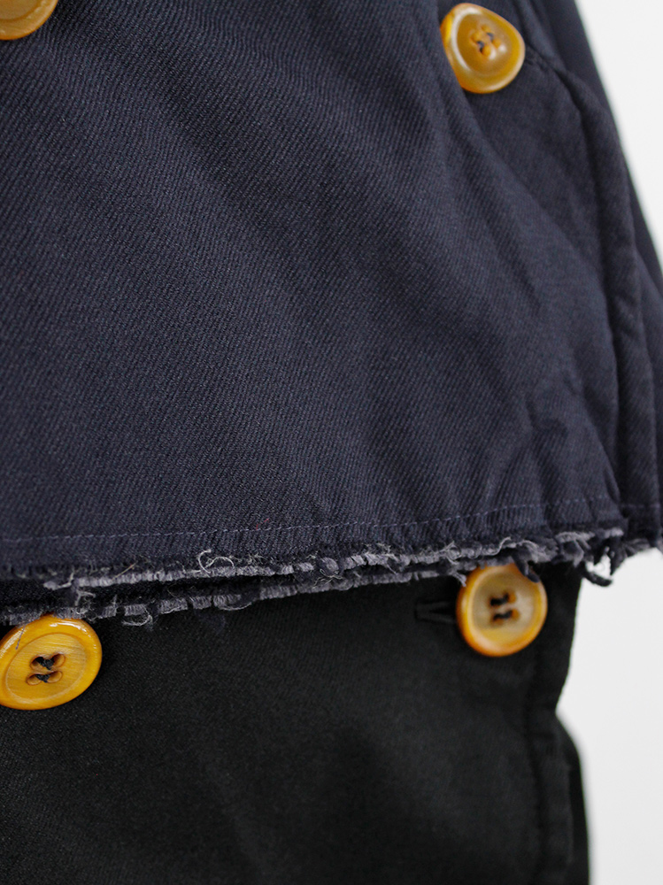 Comme des Garçons dark navy capelet from a cut off trenchcoat with orange buttons fall 2002 (9)