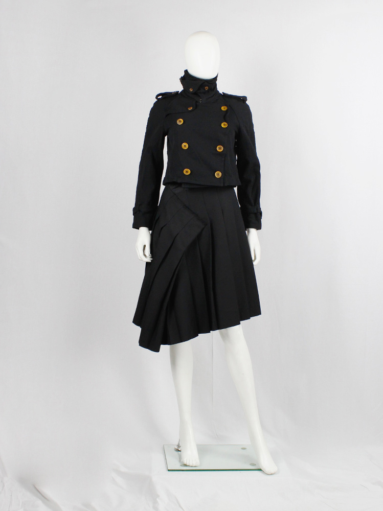 Comme des Garçons black short trenchcoat in wool with orange buttons — fall 2011