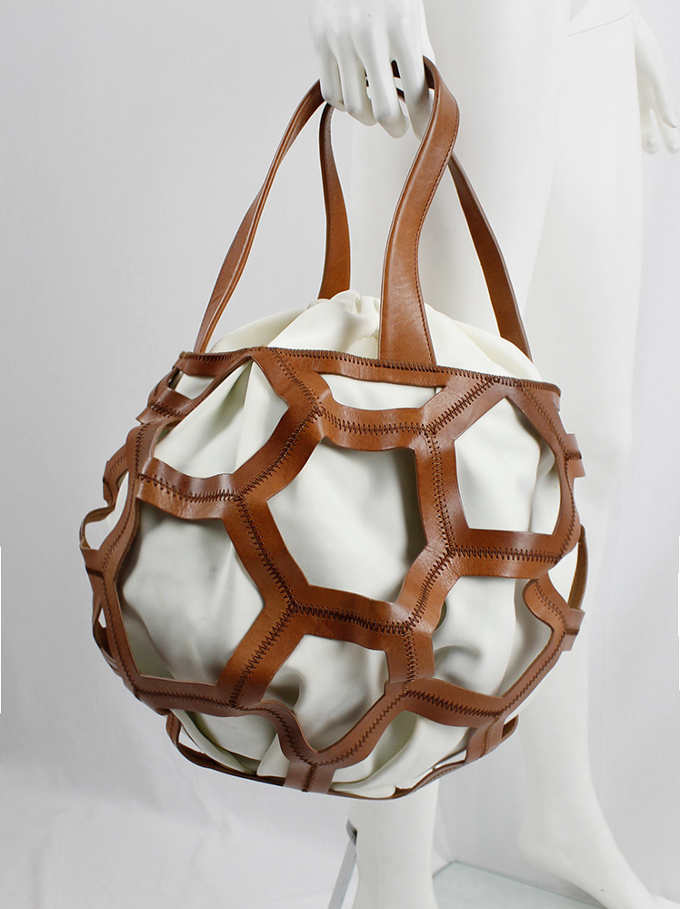vintage Dirk Bikkembergs brown leather football bag with hexagonal cutouts over a white fabric bag (12)