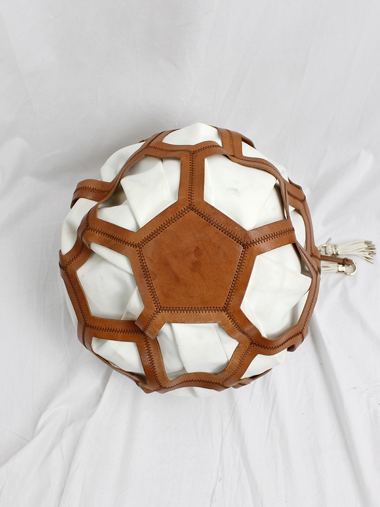 vintage Dirk Bikkembergs brown leather football bag with hexagonal cutouts over a white fabric bag (17)