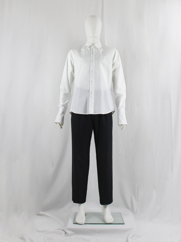 Ann Demeulemeester white shirt with front buttons half covered by a ...
