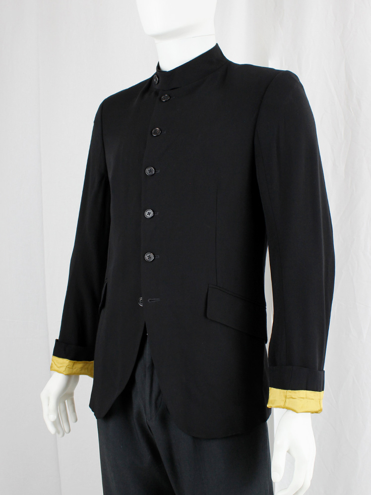 Ann Demeulemeester black bellboy jacket with 6 front button closure and yellow lining spring 2016 (3)