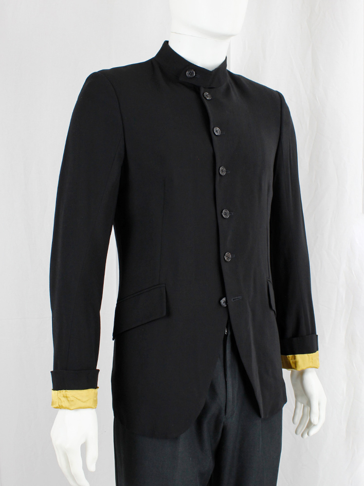 Ann Demeulemeester black bellboy jacket with 6 front button closure and yellow lining spring 2016 (5)
